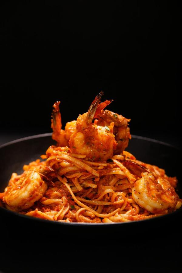 Ambiance Boutique Art Hotel Лахор Екстер'єр фото Shrimp and pasta
